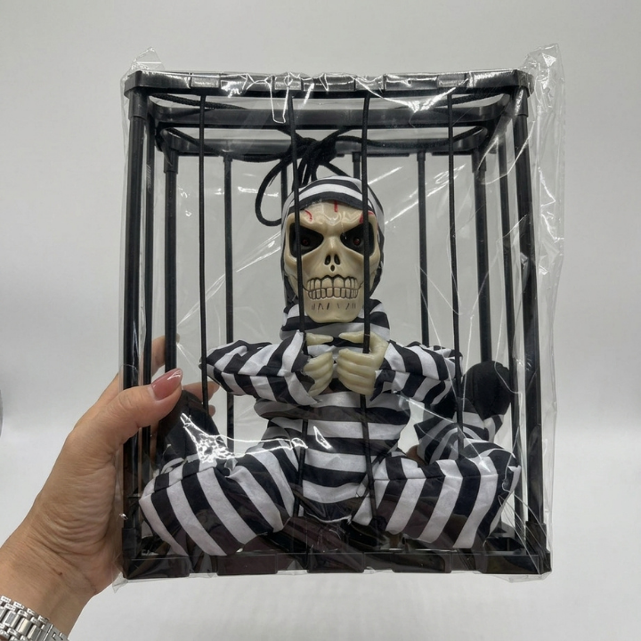 Décoration Cage à Squelette avec Détecteur de Mouvement - Yeux Lumineux et Son