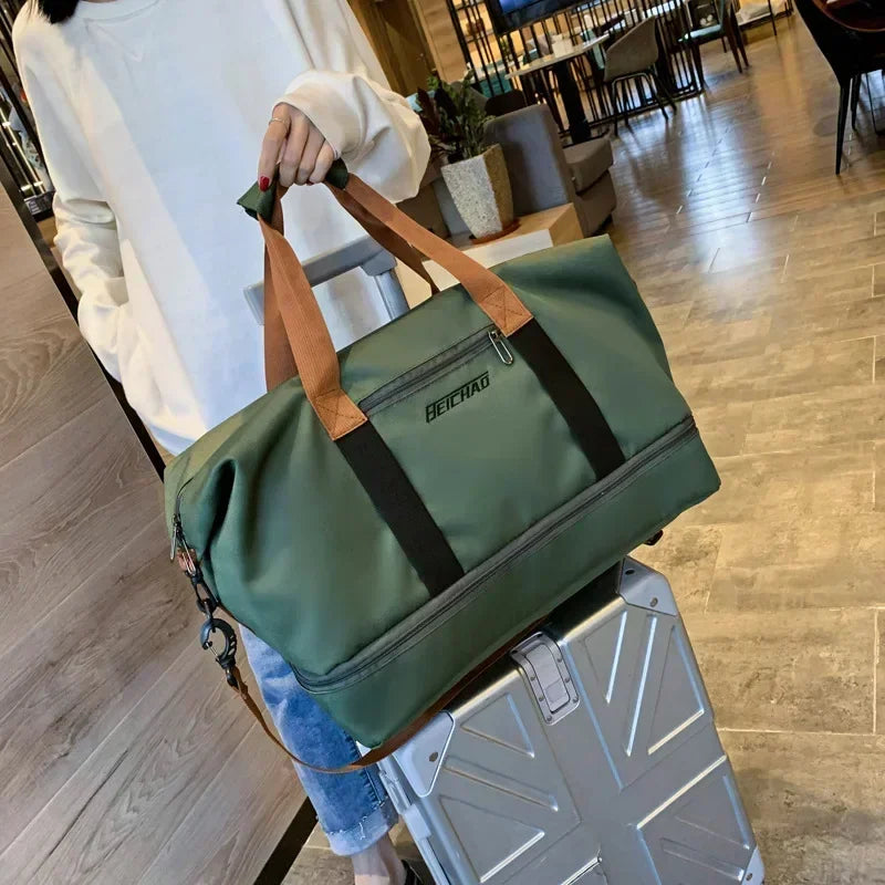 Sac de sport grand volume, déperlant, avec rangements astucieux