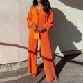 Weit geschnittener Damenanzug, elegante Jacke & fließende Hose für