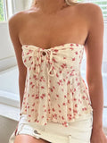 Damski top bustier w kwiaty z marszczeniem i baskinką