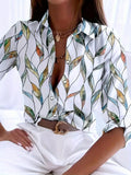 Elegante Damenbluse mit abstraktem Print, knöpfbarer Kragen, ideal