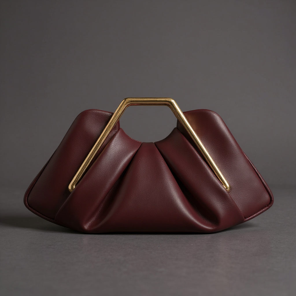 Weiche Leder-Clutch, Origami-Design, goldfarbener sechseckiger Griff
